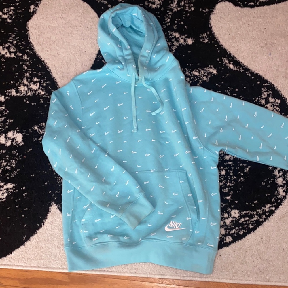 A baby blue nike hoodie